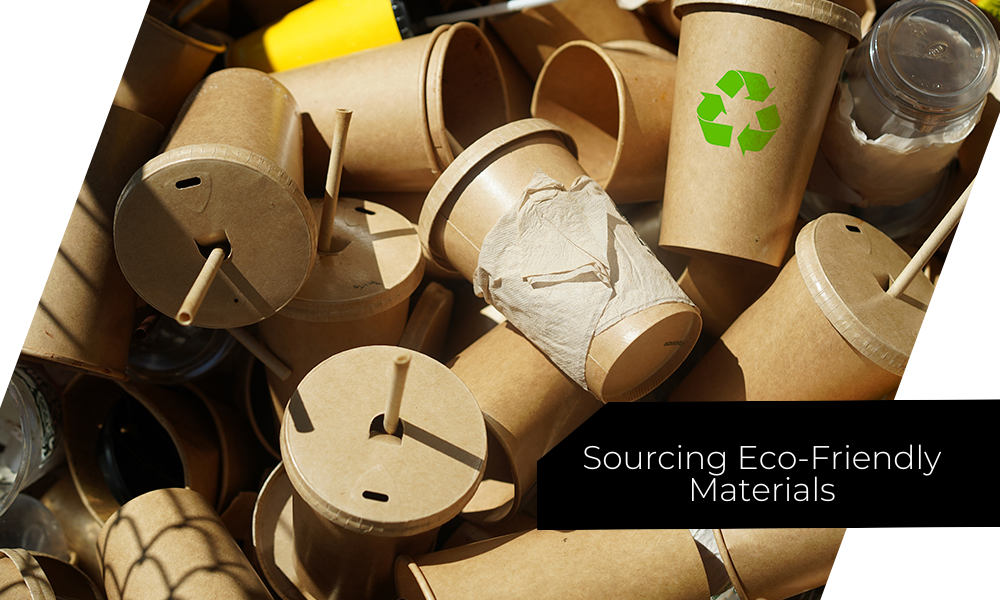 Pile of cardboard coffee cups and eco-friendly packaging materials.